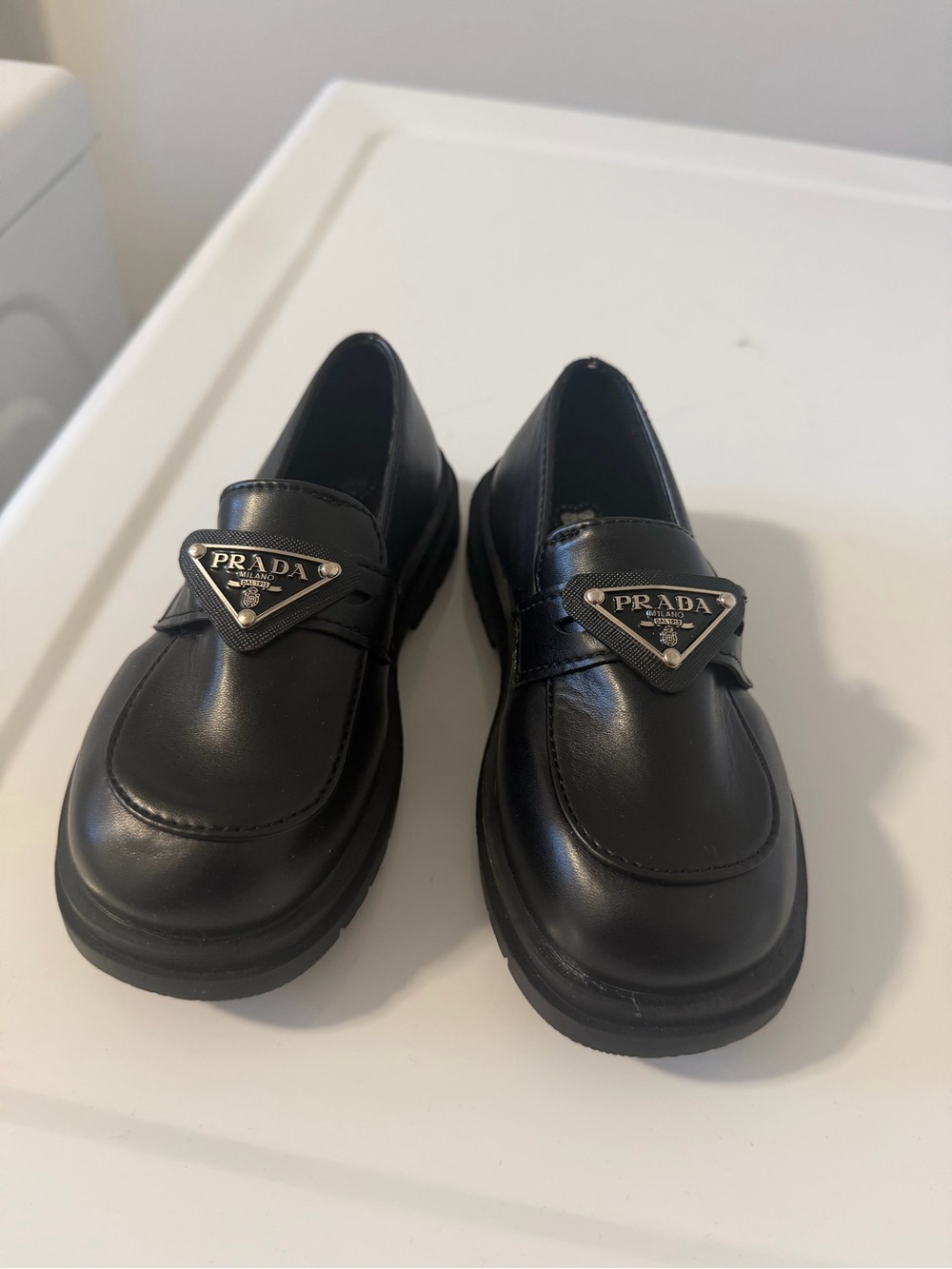 Prada Kids Black Leather Logo Penny Loafers